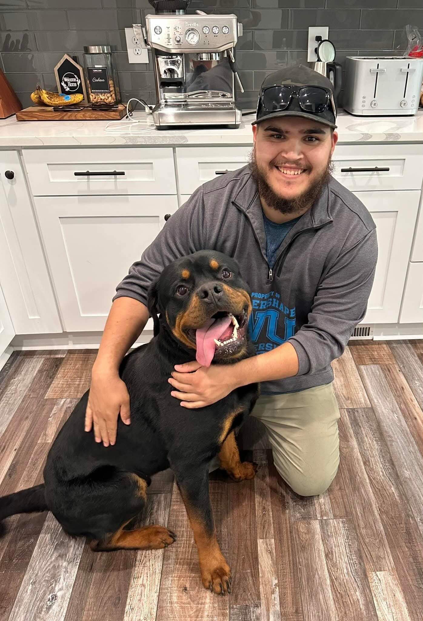Devan, First Gen Dog Training — trainer with a Rottweiler client